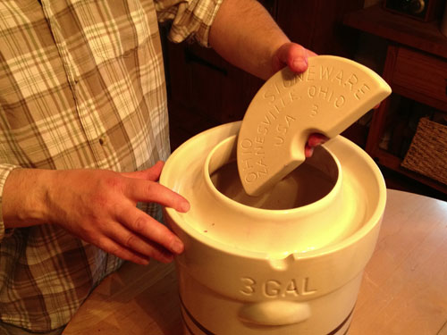 ohio stoneware ceramic weights going into the pickling crock